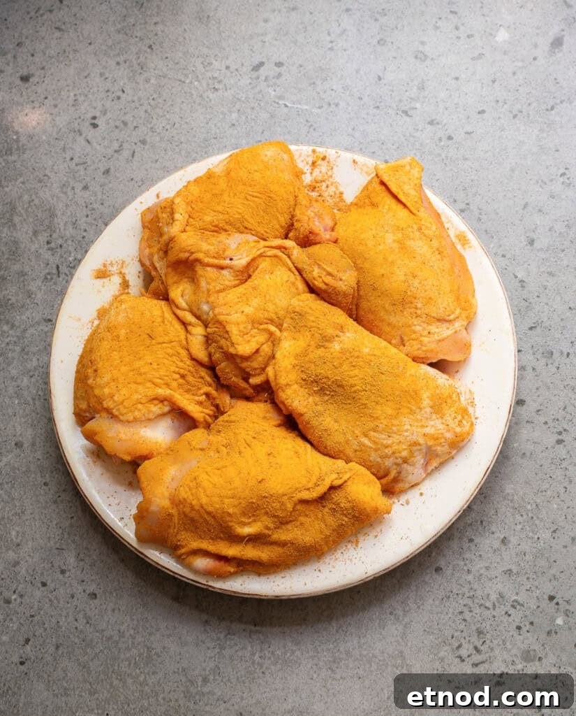 Turmeric Chicken Recipe: Flavorful Roast with Golden Spice 7 Turmeric Chicken with rub on chicken