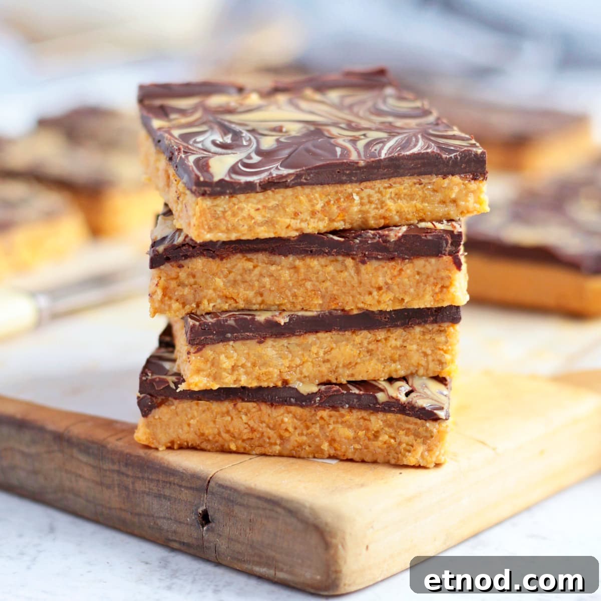 Peanut Butter slices on a board.