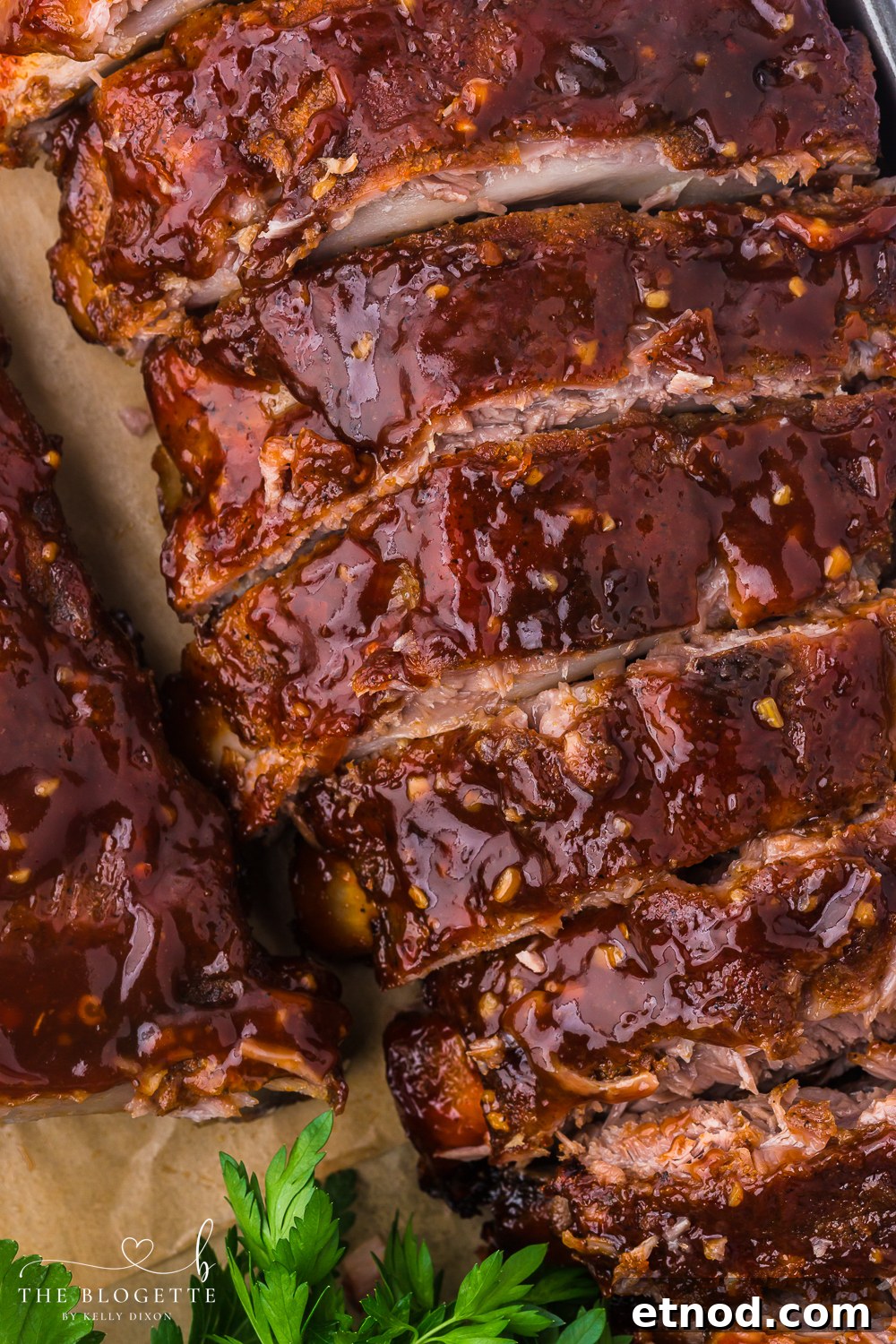 Baked Ribs - Tender ribs seasoned with a bold, flavorful sauce are baked in the oven until the meat is fall-off-the-bone. Comfort on a plate!