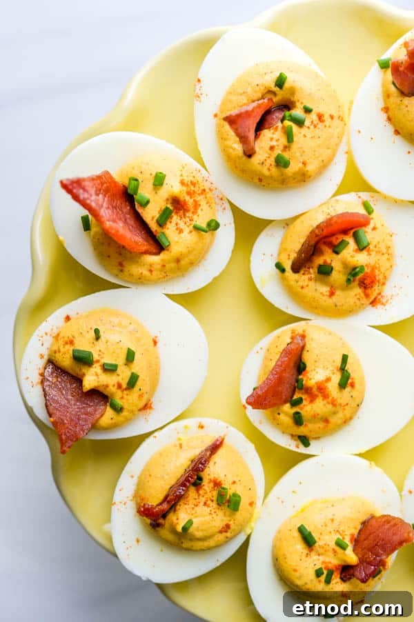 Southern-Style Deviled Eggs Recipe: Tangy Classic Appetizer 7 Southern deviled eggs on a serving platter.