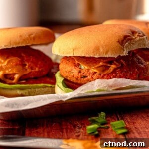 Crispy Baked Salmon Burgers with Lemon Dill Sauce 12 Salmon patties on buns.