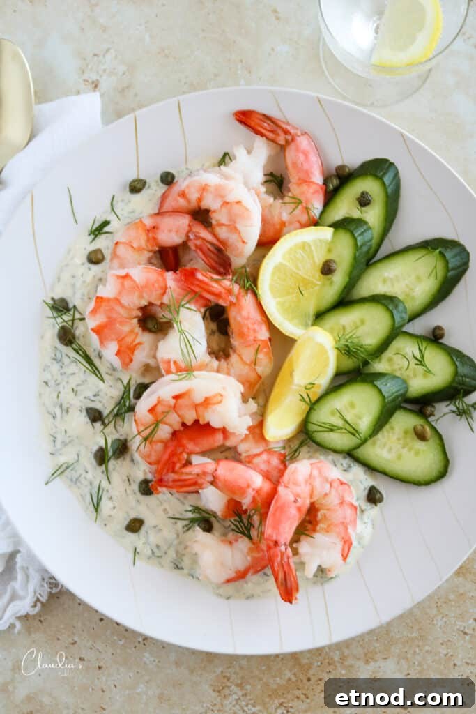 Chilled Shrimp Cocktail Recipe: Zesty Appetizer for Parties 2 chilled shrimp appetizer platter with shrimp, cucumber, capers, lemon wedges