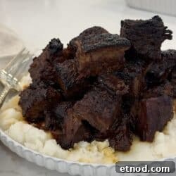 Oven-Baked Burnt Ends with Hot Honey Barbecue Glaze 5 oven baked burnt ends over mashed potatoes