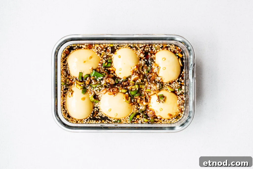 Mayak Eggs Recipe: Korean Soy-Marinated Soft-Boiled Eggs 10 Soft boiled eggs marinating in a Korean egg marinade.