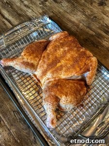 Juicy Smoked Spatchcock Chicken Recipe for Perfect BBQ Flavor 4 Smoked Spatchcock Chicken - Seasoned