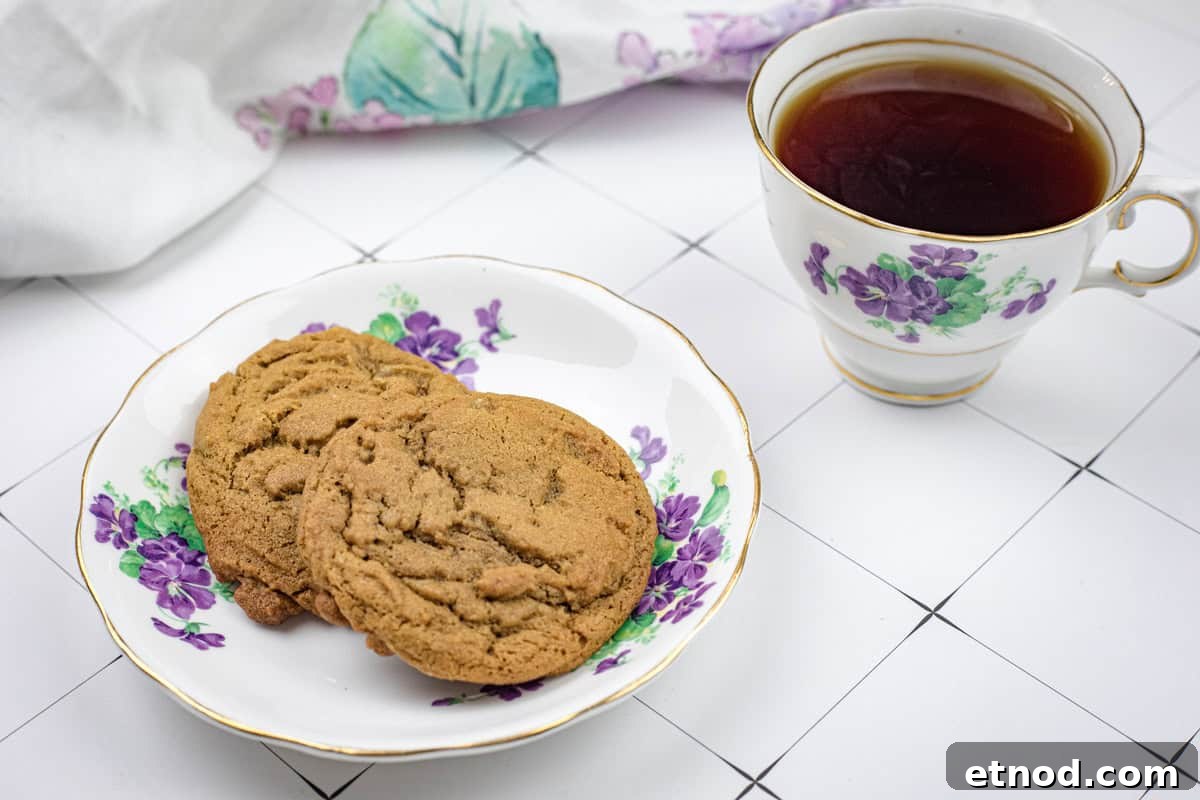 21 Quirky-Looking Desserts That Disappear First at Parties 11 A plate of Spiced Ginger Cookies and a cup of tea.