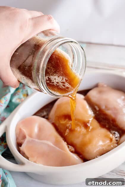 Pour marinade all over chicken breasts.