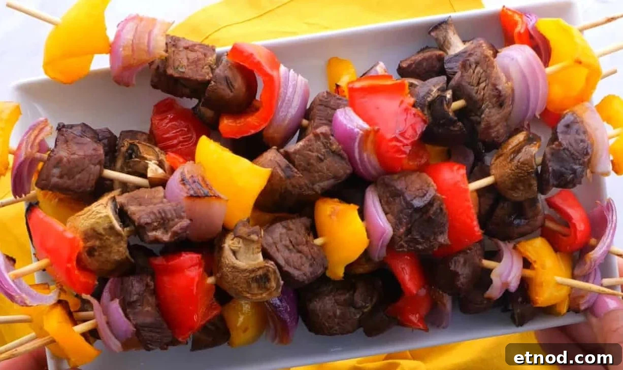 Plate of steak kabobs in beef kabob marinade.