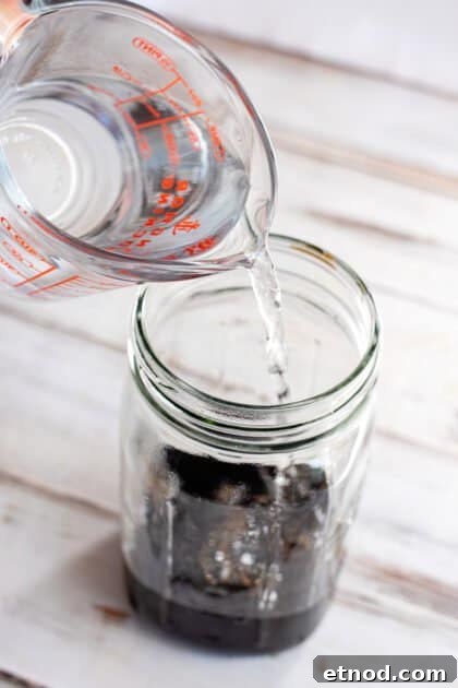 Add water to jar.