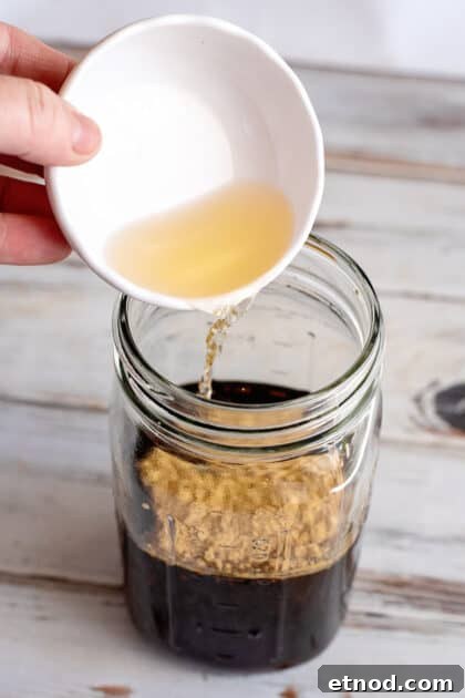 Add apple cider vinegar to jar.