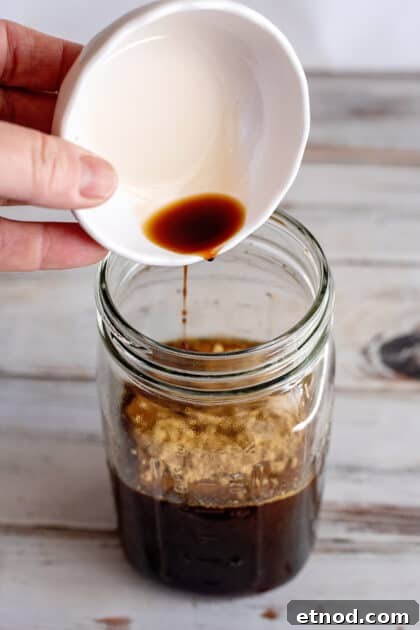 Add liquid smoke to jar.